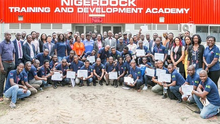 *Group photograph with dignitaries and trainees at the Graduation Ceremony of EGINA NHCD Vocational Training at Nigerdock held recently at Snake Island Integrated Free Zone, Lagos  --